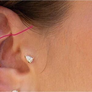 Logan Hollowell pear diamond stud with orbit backing